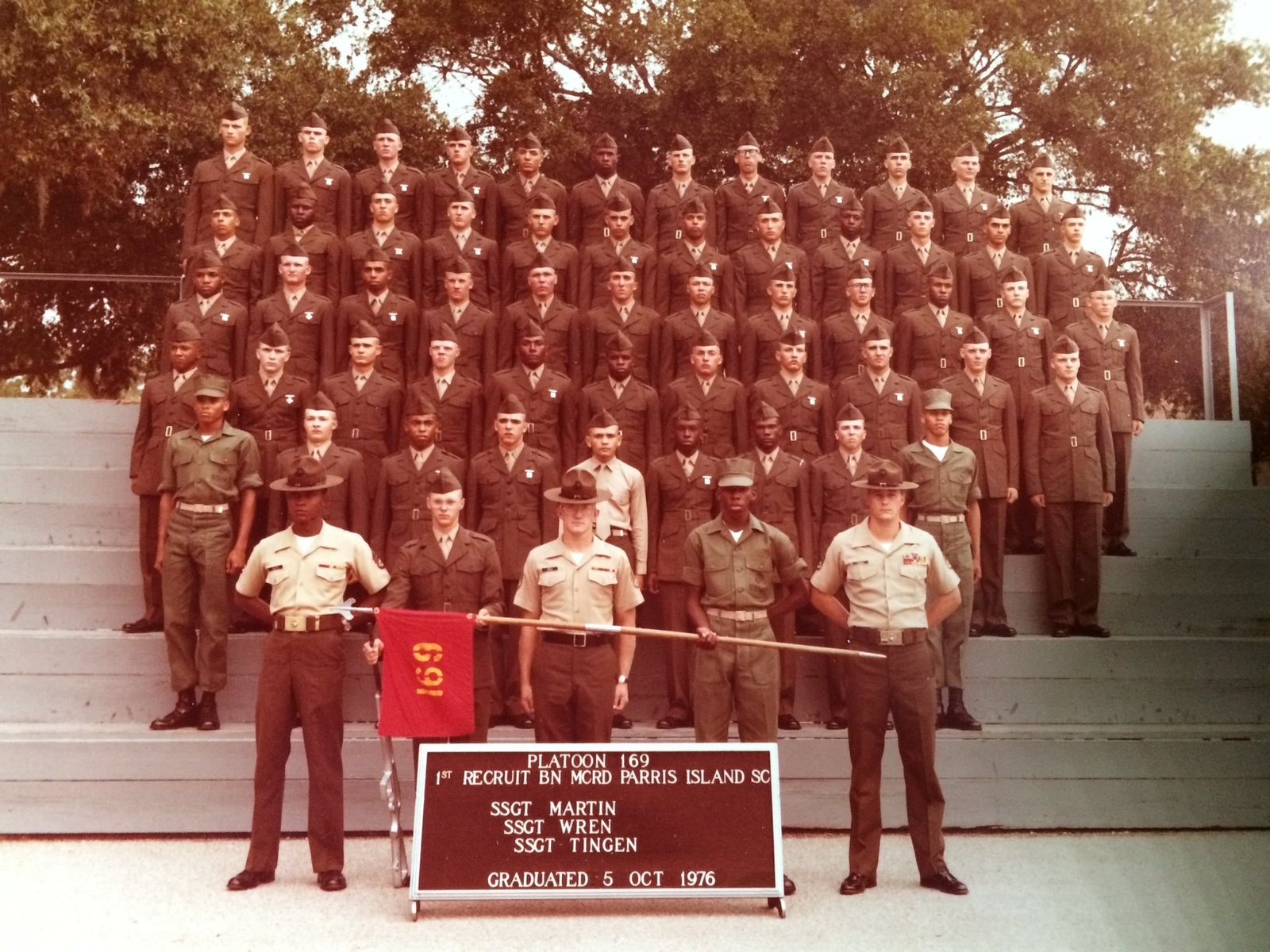 About Peter Kici, EA 2 Marine Corps Platoon 169 graduation photo, Parris Island, South Carolina, October 5, 1976. Peter Kici is in the top row, third from the left.